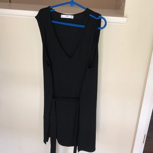 Black tank blouse with a tie to sinch the waist
